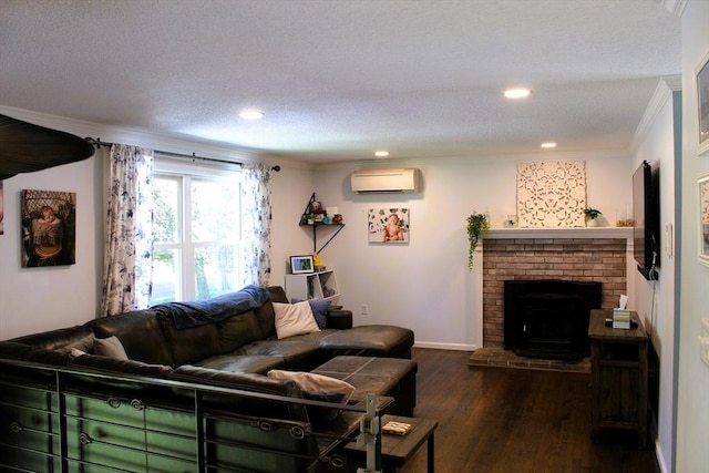 13 Laurana Ln, Hadley, MA 01035 - living room featuring a wall mounted AC, crown molding, dark wood finished floors, recessed lighting, and a textured ceiling