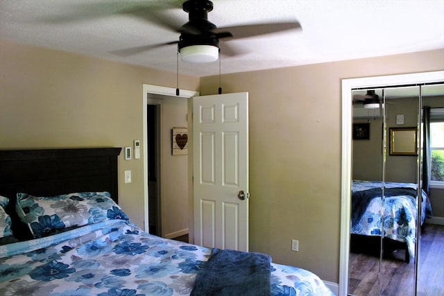 13 Laurana Ln, Hadley, MA 01035 - bedroom featuring wood finished floors, a closet, ceiling fan, and baseboards