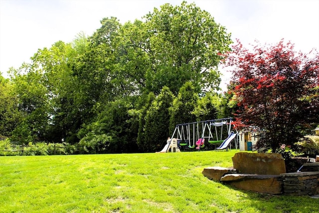 13 Laurana Ln, Hadley, MA 01035 - view of grassy yard with a playground