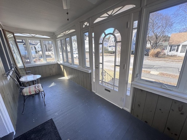 unfurnished sunroom with a healthy amount of sunlight