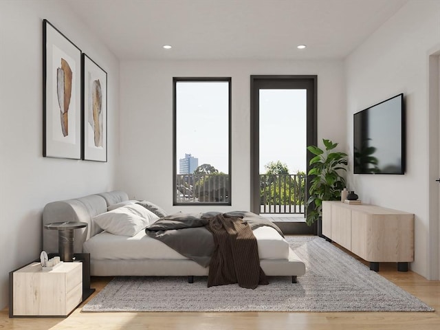 bedroom featuring light wood finished floors and recessed lighting