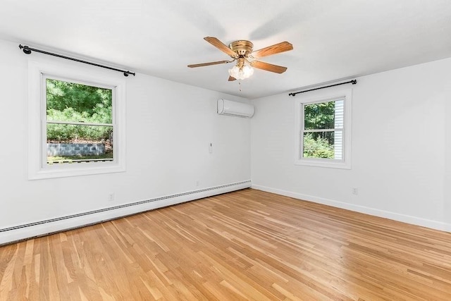 126 Scott Cir, Dedham, MA 02026 - spare room featuring an AC wall unit, a baseboard radiator, light wood finished floors, a ceiling fan, and baseboards