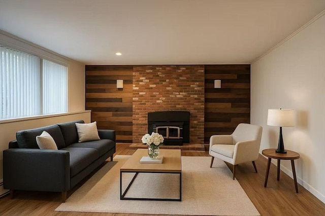 126 Scott Cir, Dedham, MA 02026 - living room featuring wood finished floors, wooden walls, baseboards, and recessed lighting