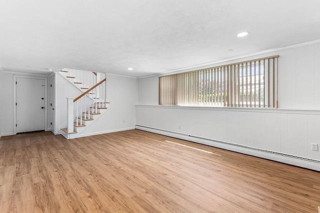 126 Scott Cir, Dedham, MA 02026 - empty room with baseboard heating, wood finished floors, ornamental molding, stairs, and baseboards