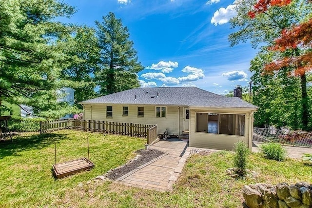 126 Scott Cir, Dedham, MA 02026 - rear view of property with a chimney and a patio
