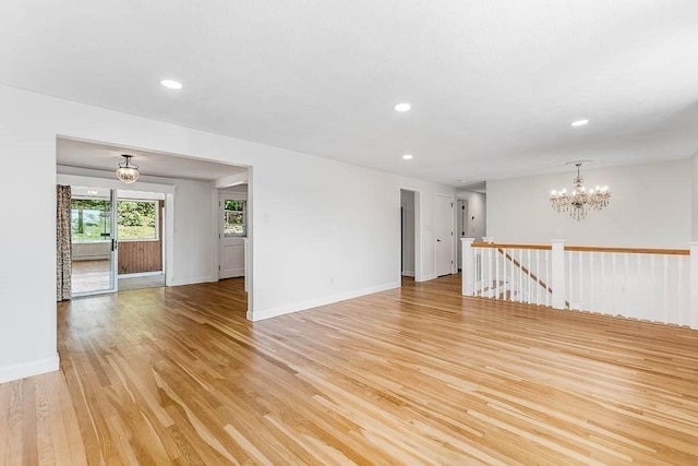 126 Scott Cir, Dedham, MA 02026 - spare room featuring a chandelier, light wood-style flooring, recessed lighting, and baseboards