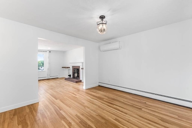 126 Scott Cir, Dedham, MA 02026 - unfurnished living room with a baseboard heating unit, a wall unit AC, light wood-style floors, and baseboards