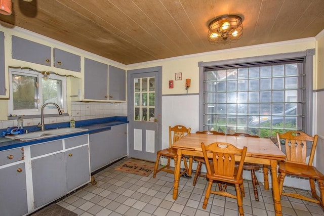 8 N Longyard Rd, Southwick, MA 01077 - kitchen with a sink, wooden ceiling, healthy amount of natural light, crown molding, and light tile patterned floors