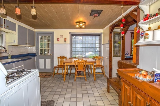 8 N Longyard Rd, Southwick, MA 01077 - kitchen featuring a sink, wood ceiling, light tile patterned flooring, white range with gas cooktop, and tasteful backsplash