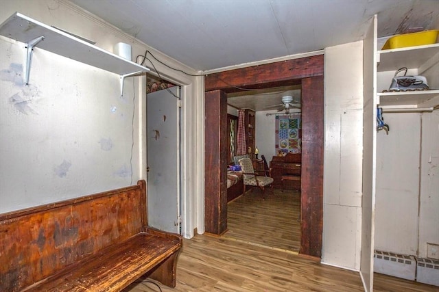 8 N Longyard Rd, Southwick, MA 01077 - corridor featuring wood finished floors and a baseboard radiator