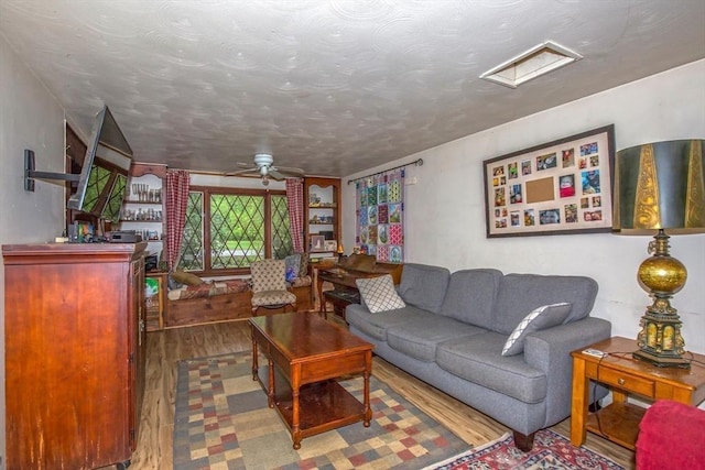 8 N Longyard Rd, Southwick, MA 01077 - living area featuring wood finished floors and a ceiling fan