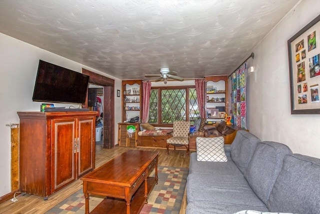 8 N Longyard Rd, Southwick, MA 01077 - living area with light wood-style flooring and ceiling fan