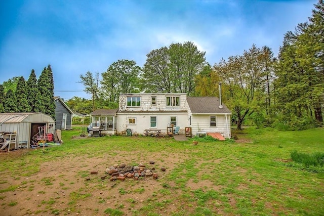 8 N Longyard Rd, Southwick, MA 01077 - back of house with an outbuilding, a shed, and a yard