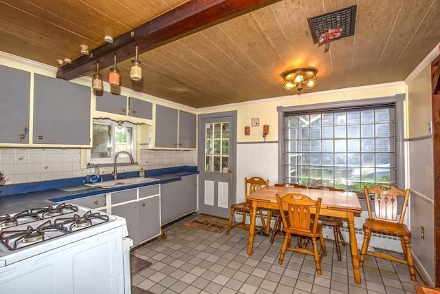 8 N Longyard Rd, Southwick, MA 01077 - kitchen with a sink, wood ceiling, healthy amount of natural light, white range with gas cooktop, and ornamental molding