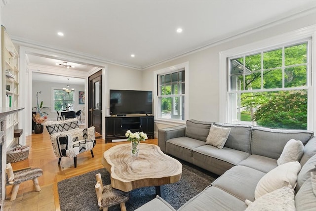18 Alden St, Newton, MA 02459 - living room with crown molding, a chandelier, and recessed lighting