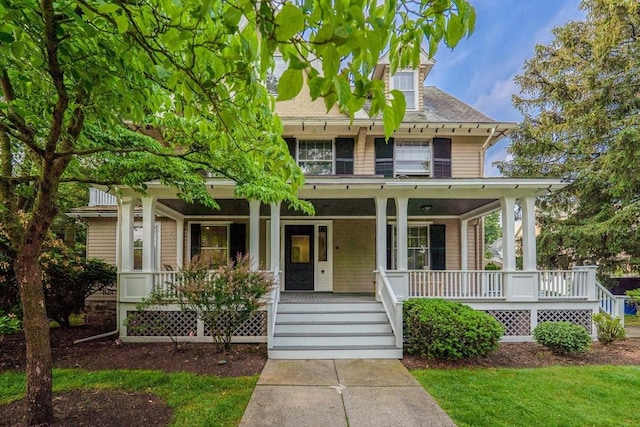 18 Alden St, Newton, MA 02459 - view of front facade featuring a porch