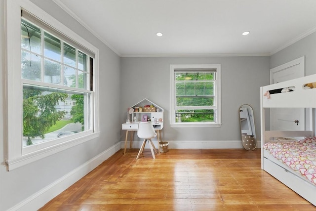 18 Alden St, Newton, MA 02459 - bedroom featuring light wood finished floors and ornamental molding