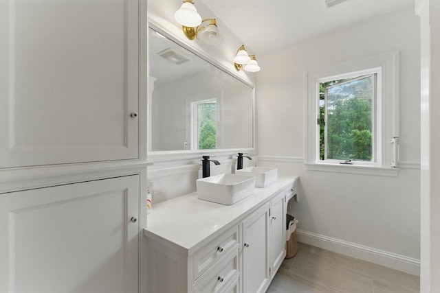 18 Alden St, Newton, MA 02459 - bathroom with vanity and wood finished floors