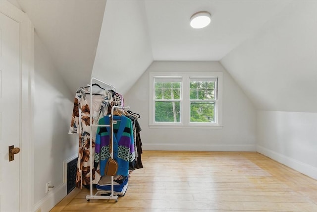 18 Alden St, Newton, MA 02459 - additional living space with hardwood / wood-style flooring and vaulted ceiling