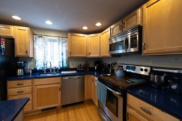 143 Eagle St, Ware, MA 01082 - kitchen with recessed lighting, light wood-style flooring, appliances with stainless steel finishes, a sink, and visible vents