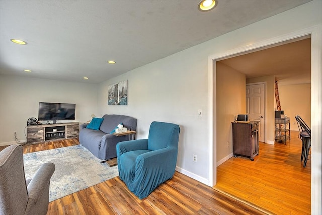143 Eagle St, Ware, MA 01082 - living room featuring recessed lighting, wood finished floors, and baseboards