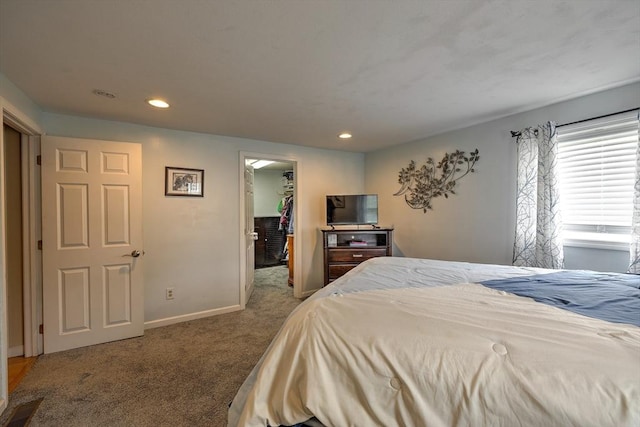 143 Eagle St, Ware, MA 01082 - carpeted bedroom featuring a closet, a spacious closet, recessed lighting, and baseboards