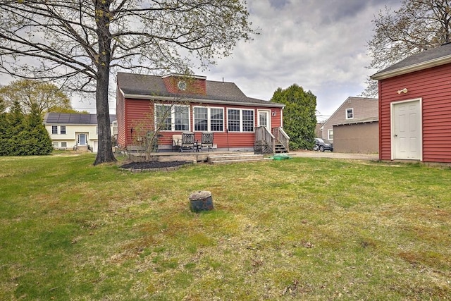 143 Eagle St, Ware, MA 01082 - rear view of house with a yard