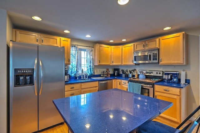 143 Eagle St, Ware, MA 01082 - kitchen with appliances with stainless steel finishes, dark stone counters, recessed lighting, and a sink