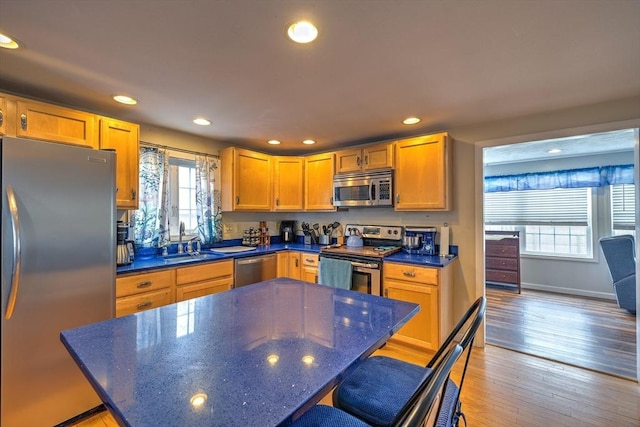 143 Eagle St, Ware, MA 01082 - kitchen with recessed lighting, stainless steel appliances, a sink, and plenty of natural light