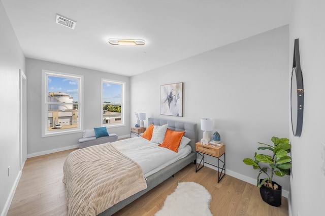 bedroom featuring light wood-type flooring