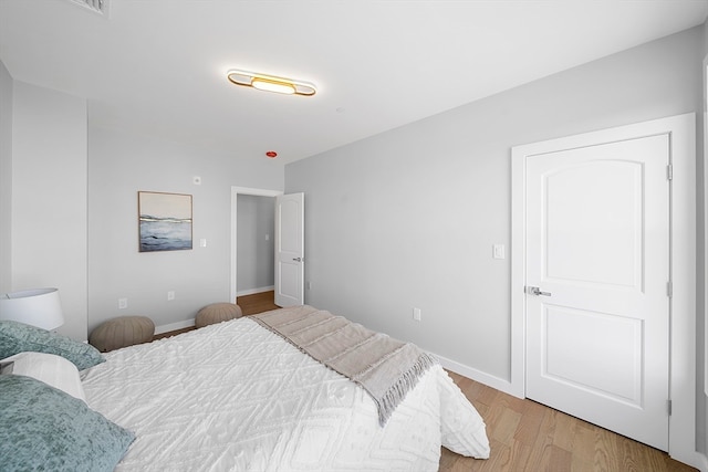 bedroom featuring light hardwood / wood-style flooring