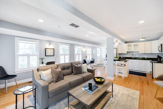 606 W Falmouth Hwy Unit 7, Falmouth, MA 02540 - living area featuring recessed lighting, light wood-style floors, visible vents, and baseboards