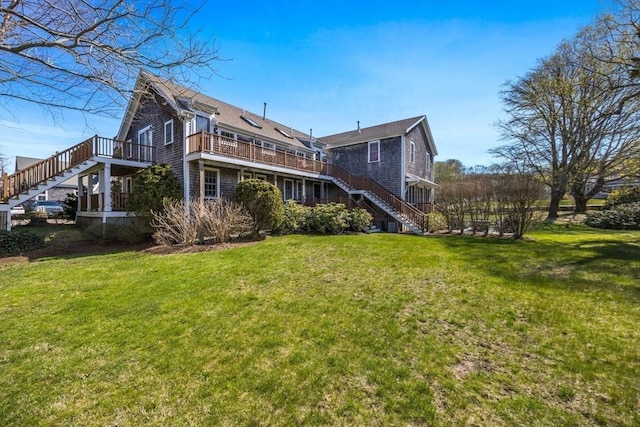 606 W Falmouth Hwy Unit 7, Falmouth, MA 02540 - back of house with a yard, a deck, and stairs