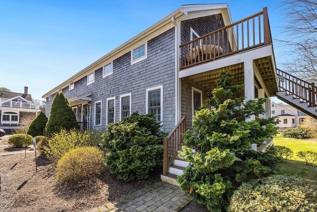 606 W Falmouth Hwy Unit 7, Falmouth, MA 02540 - view of home's exterior with a wooden deck and stairs