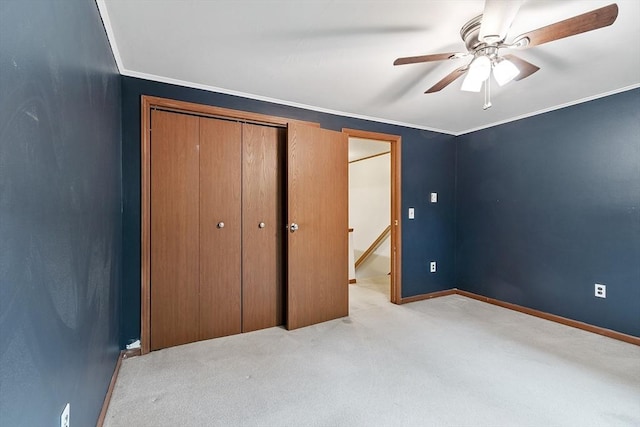 24 Mountainshire Dr Unit 24, Worcester, MA 01606 - unfurnished bedroom with light carpet, a closet, baseboards, ceiling fan, and crown molding