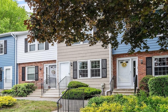 24 Mountainshire Dr Unit 24, Worcester, MA 01606 - view of property featuring brick siding and entry steps