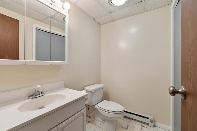 24 Mountainshire Dr Unit 24, Worcester, MA 01606 - half bathroom with a baseboard radiator, toilet, vanity, a paneled ceiling, and baseboards