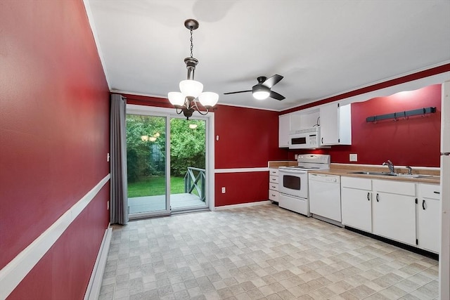 24 Mountainshire Dr Unit 24, Worcester, MA 01606 - kitchen with white appliances, a sink, baseboards, white cabinets, and a chandelier