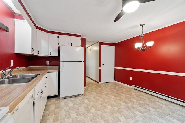 24 Mountainshire Dr Unit 24, Worcester, MA 01606 - kitchen featuring freestanding refrigerator, a sink, ceiling fan, and white cabinetry