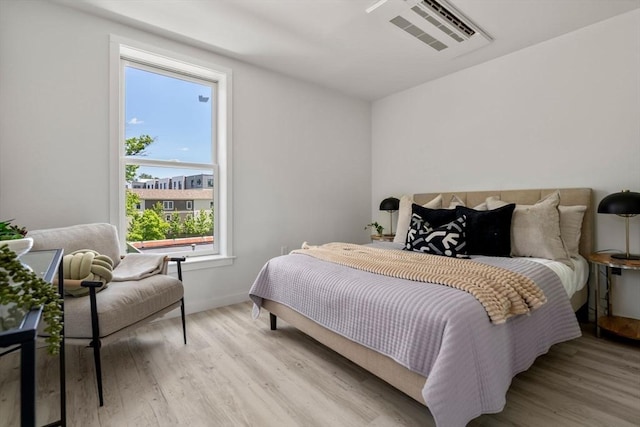 602 Canterbury Unit 5, Boston, MA 02131 - bedroom featuring light wood-type flooring and multiple windows