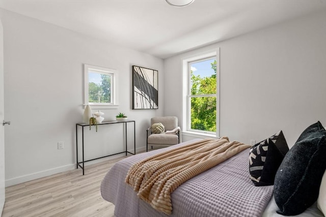 602 Canterbury Unit 5, Boston, MA 02131 - bedroom featuring light wood-style floors and baseboards