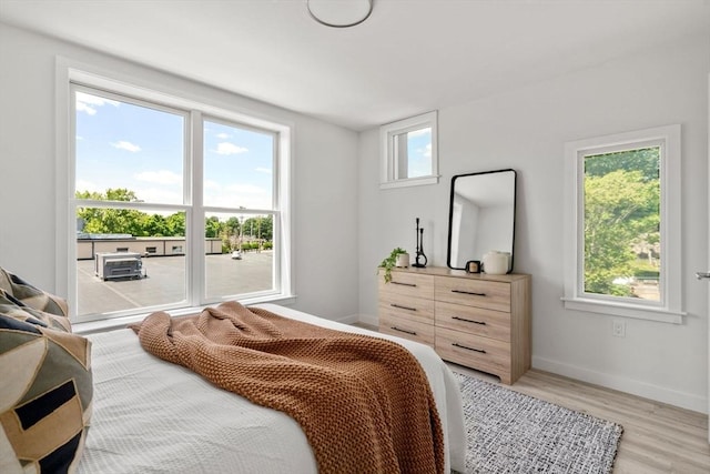 602 Canterbury Unit 5, Boston, MA 02131 - bedroom with light wood-type flooring and baseboards