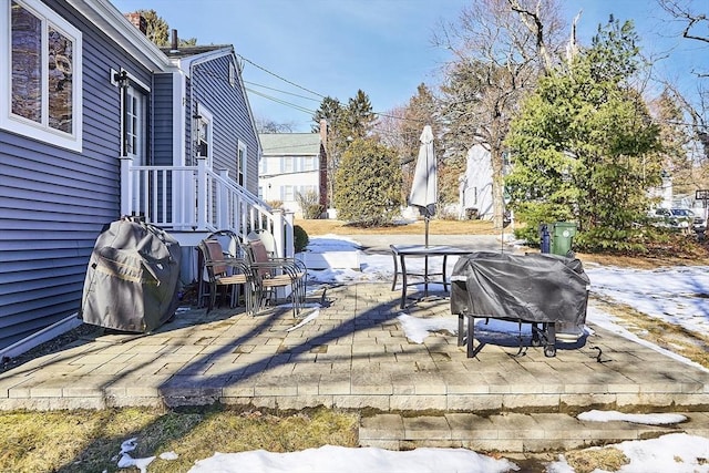 view of patio featuring a grill