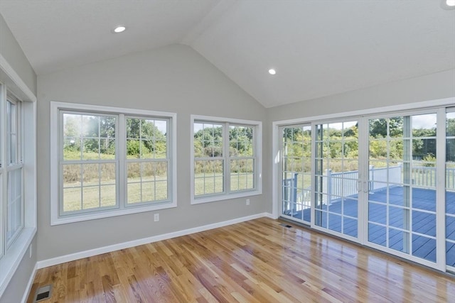unfurnished sunroom featuring visible vents