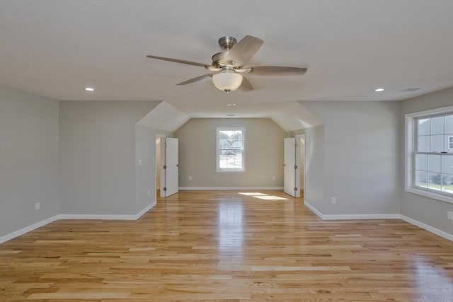 bonus room with baseboards, recessed lighting, light wood finished floors, and ceiling fan
