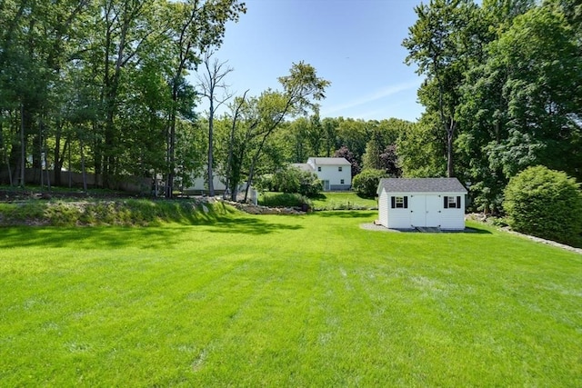 13 Woodland Dr, Hudson, MA 01749 - view of grassy yard with a view of trees