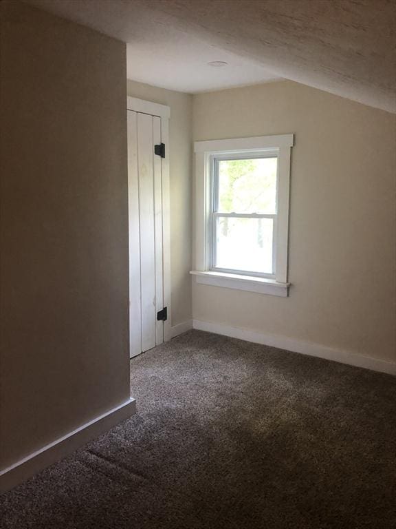 31 Benham St, Orange, MA 01364 - carpeted empty room featuring baseboards