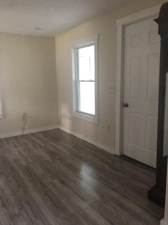 31 Benham St, Orange, MA 01364 - spare room with baseboards and wood finished floors
