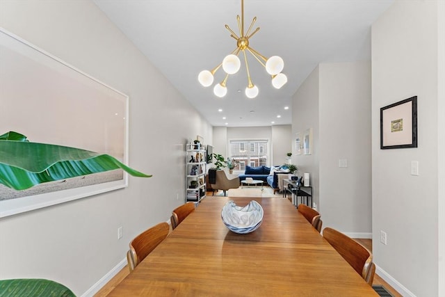 dining area with a notable chandelier