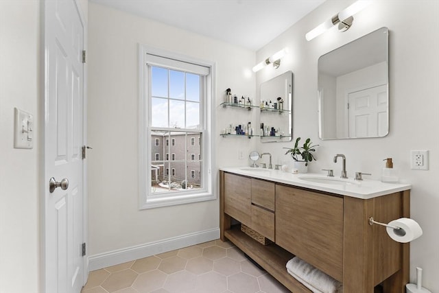 bathroom with vanity and tile patterned floors